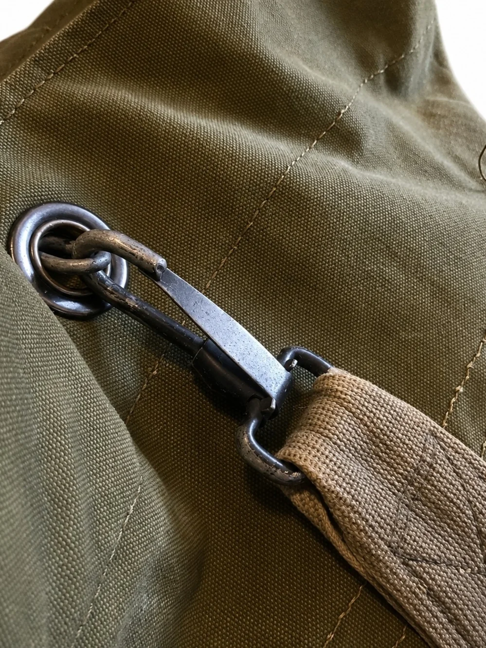 Vintage olive green canvas duffle bag
